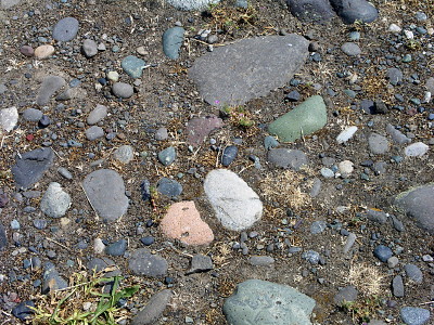 [Green, pinkish, grey, and other colored rocks.]